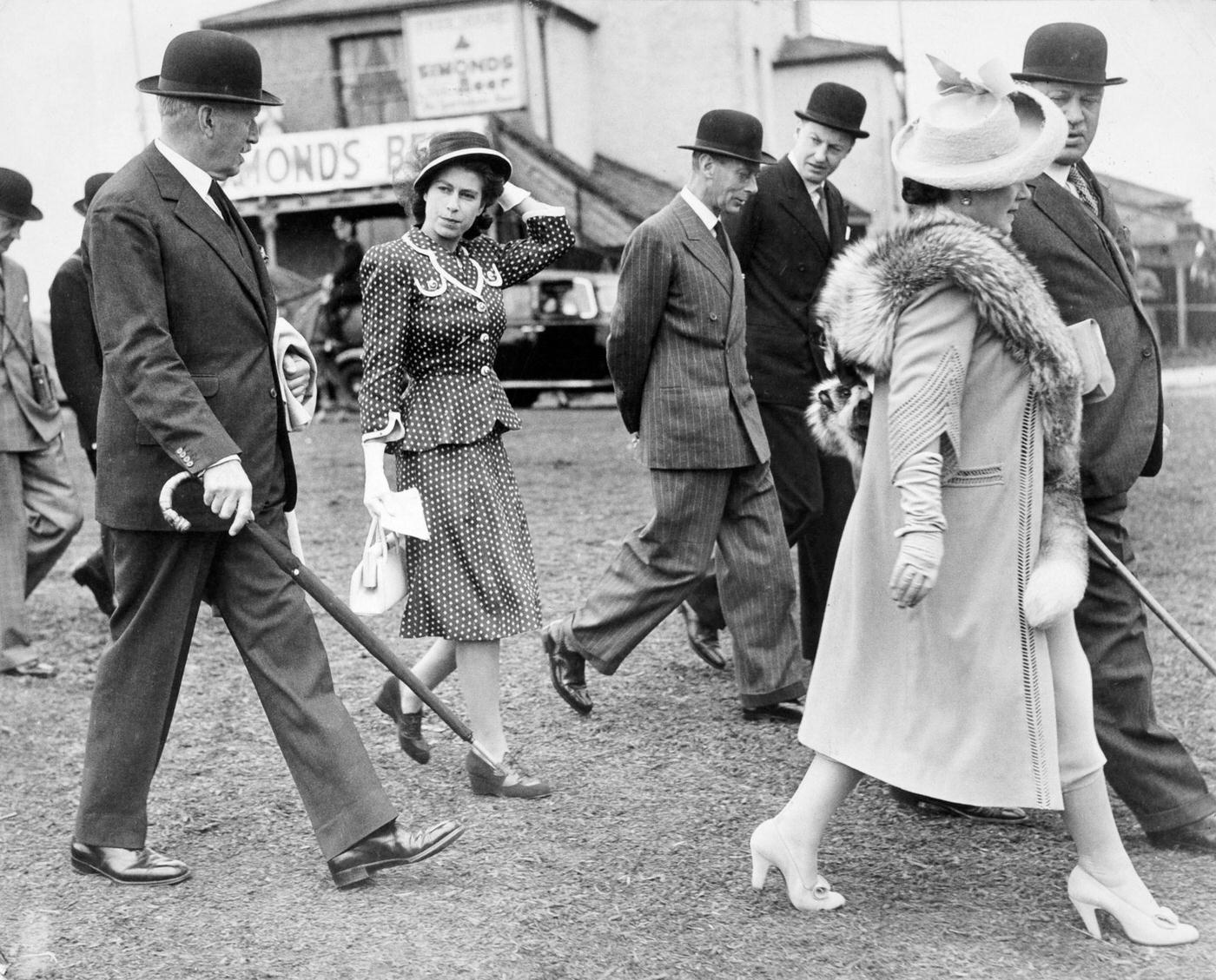 Princess Elizabeth with King George VI and Queen Elizabeth at Epsom, England, 5 June 1947.