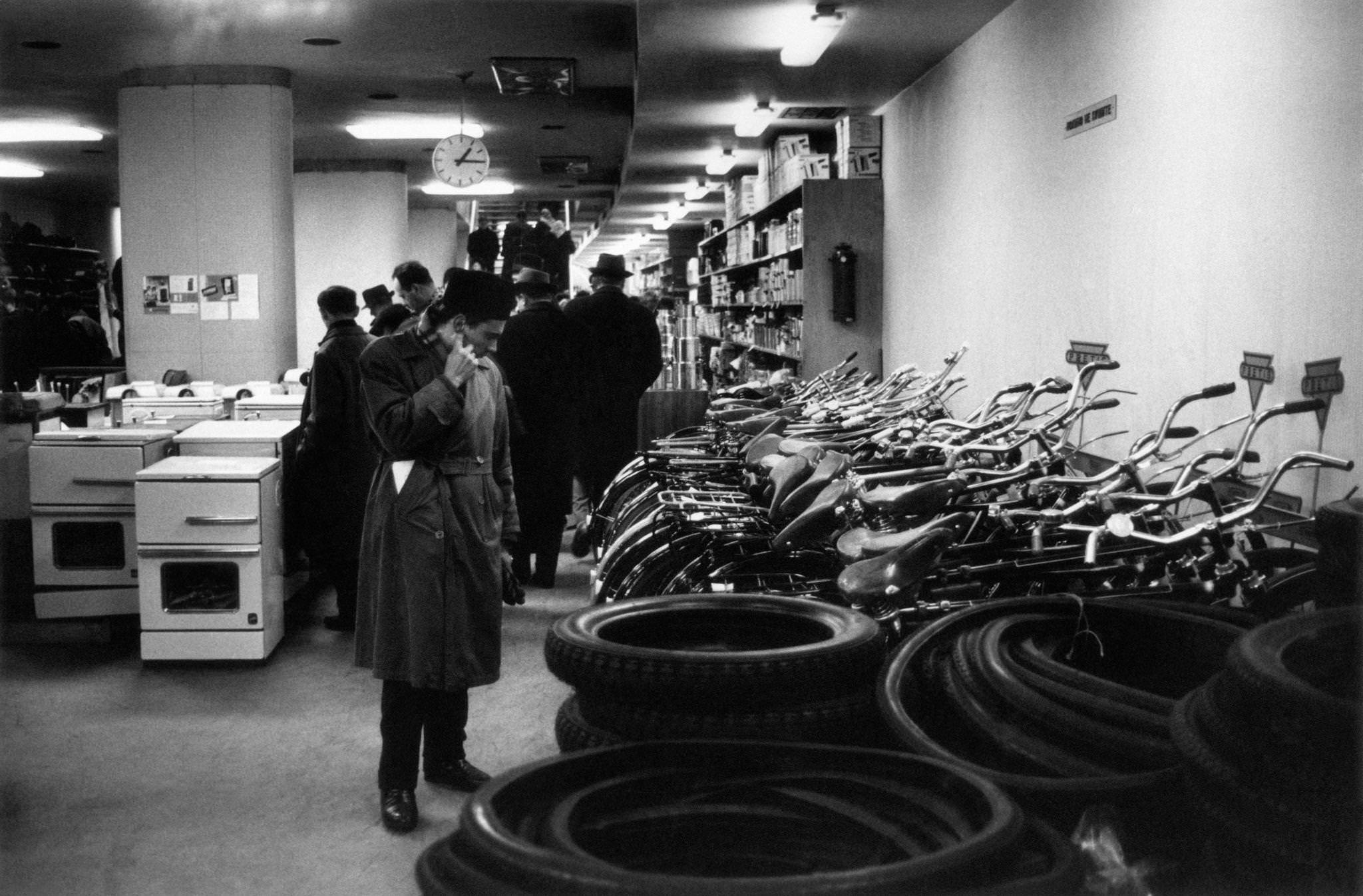 People watching goods displayed at the department store in Belgrade, 1965