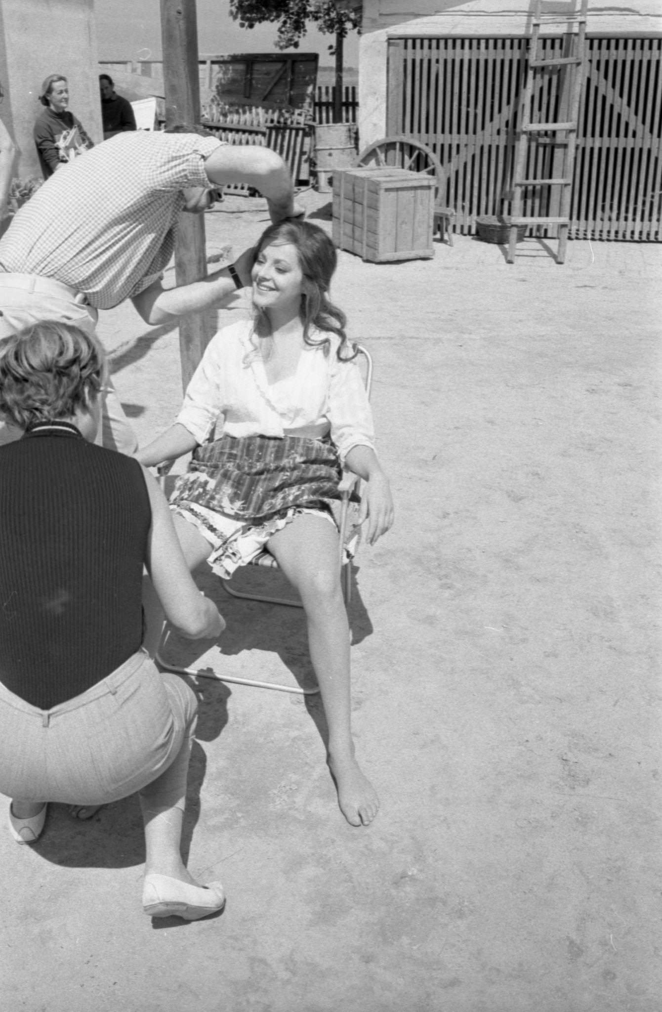 Italian actress Virna Lisi gets a suntan and a makeup job while waiting to go on camera for the MGM film, ‘The 25th Hour,' being shot on location in Yugoslavia.