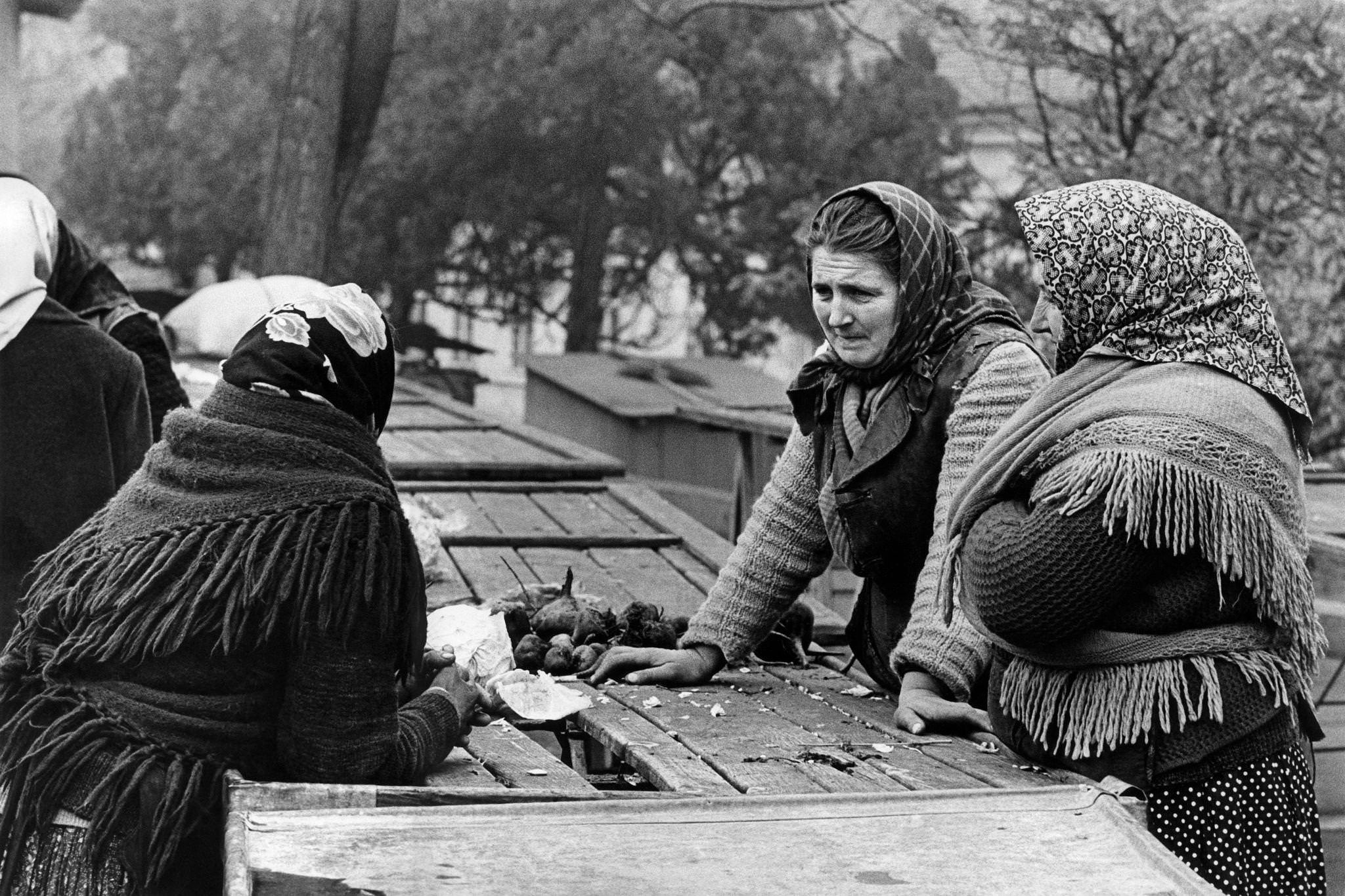 Three Yugoslav women talking at the open-air market in Belgrade, Serbia, 1965