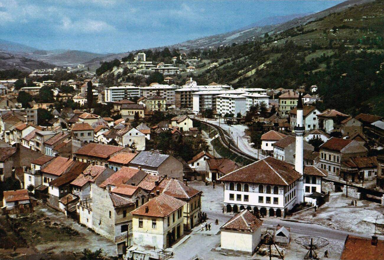 The early 1960s view of Travnik from the east end with the narrow-gauge railway passing through town.