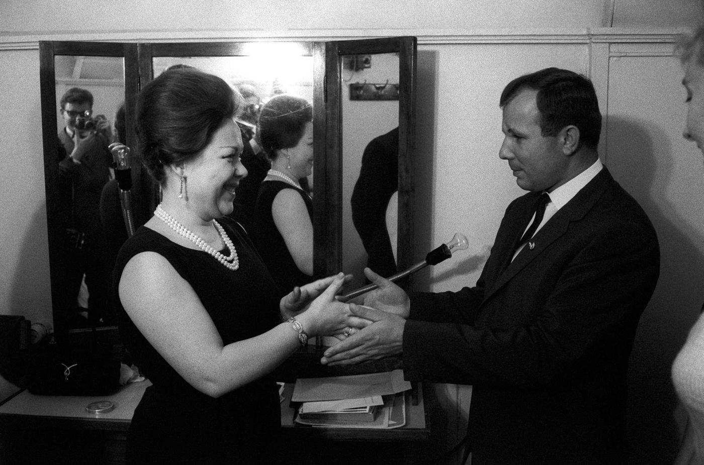 Soviet astronaut Yuri Gagarin congratulating Italian soprano Renata Scotto, who performed in 'Turandot' at the Bolshoi Theatre in Moscow, 1964
