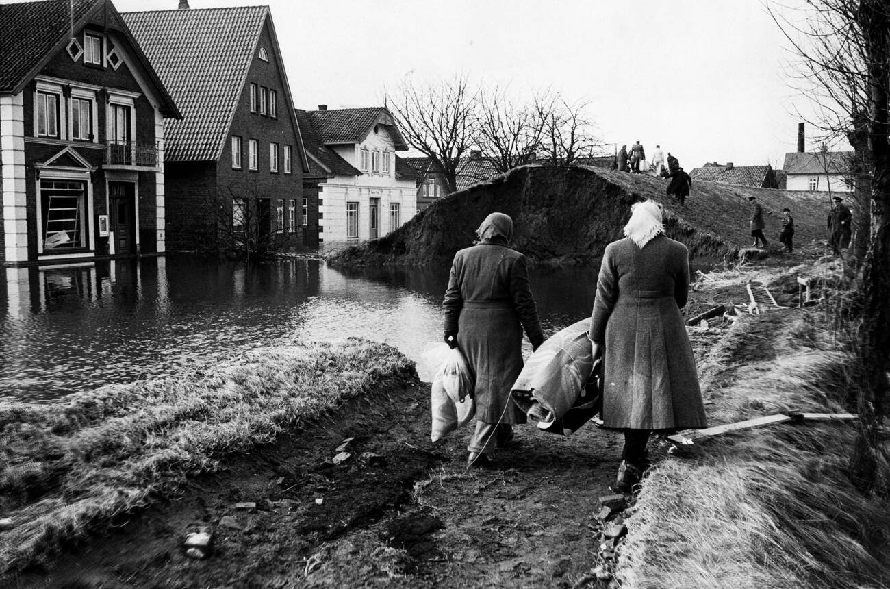 Women with saved goods during the North Sea Flood of 1962 in Hamburg, West Germany