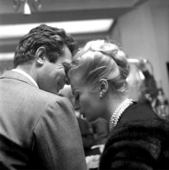 Marcello Mastroianni and Anita Ekberg at a press event for the Federico Fellini comedy-drama La Dolce Vita held at the Martini Terrace in Milan, Italy on February 5th, 1960