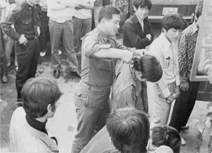 Forced haircut during South Korea's crackdown on long hair