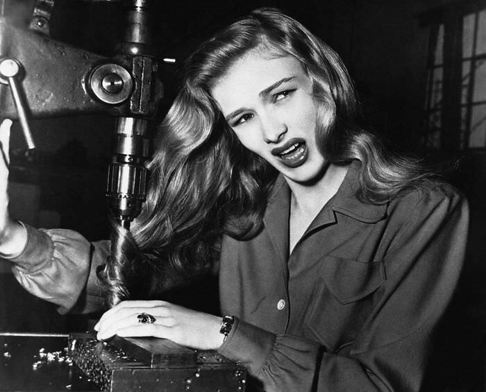 Veronica Lake demonstrates the dangers of long hair for women war workers, 1943