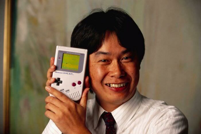 Shigeru Miyamoto, Creator of Mario and Nintendo Games, with Game Boy (1992)