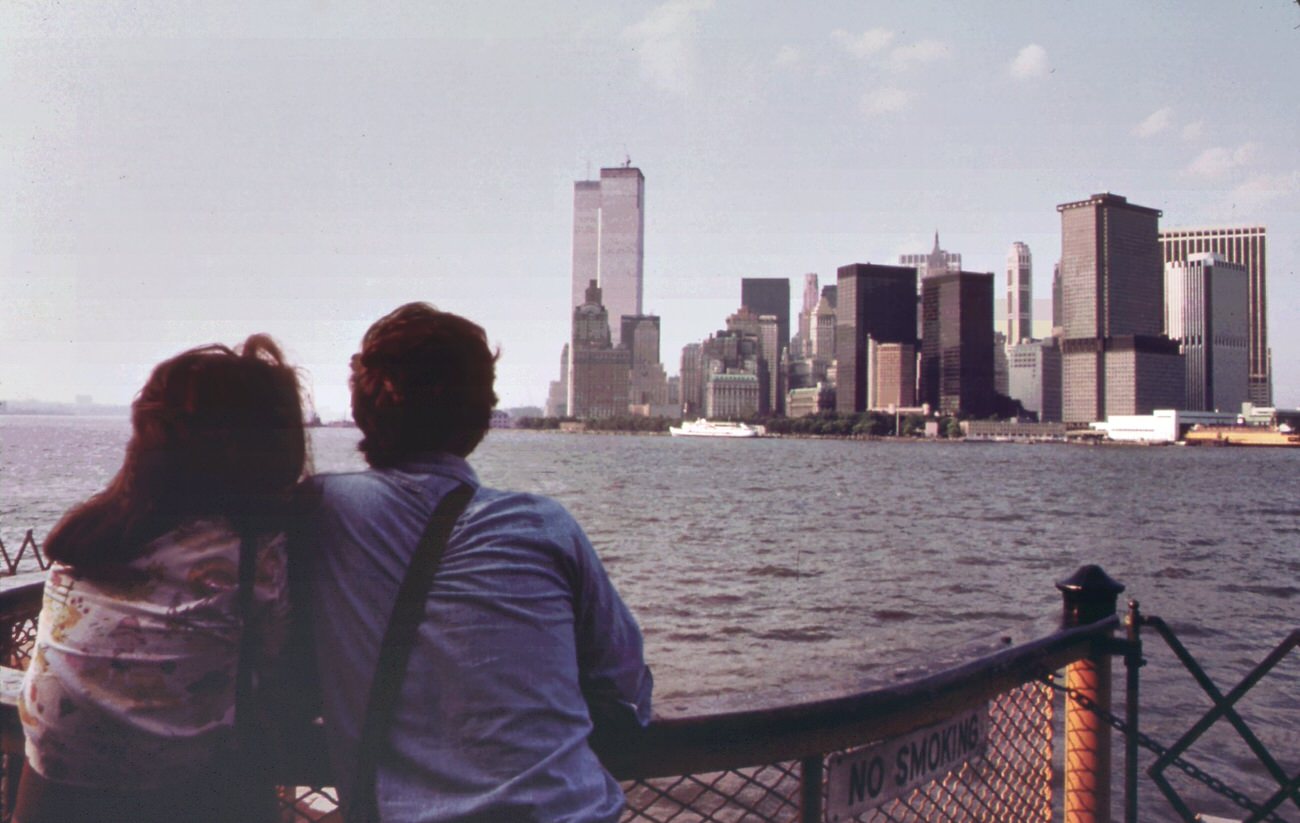On the staten island ferry, looking back toward the skyline of lower manhattan. To the left of the cluster of buldings are the towers of the world trade center, 1970s