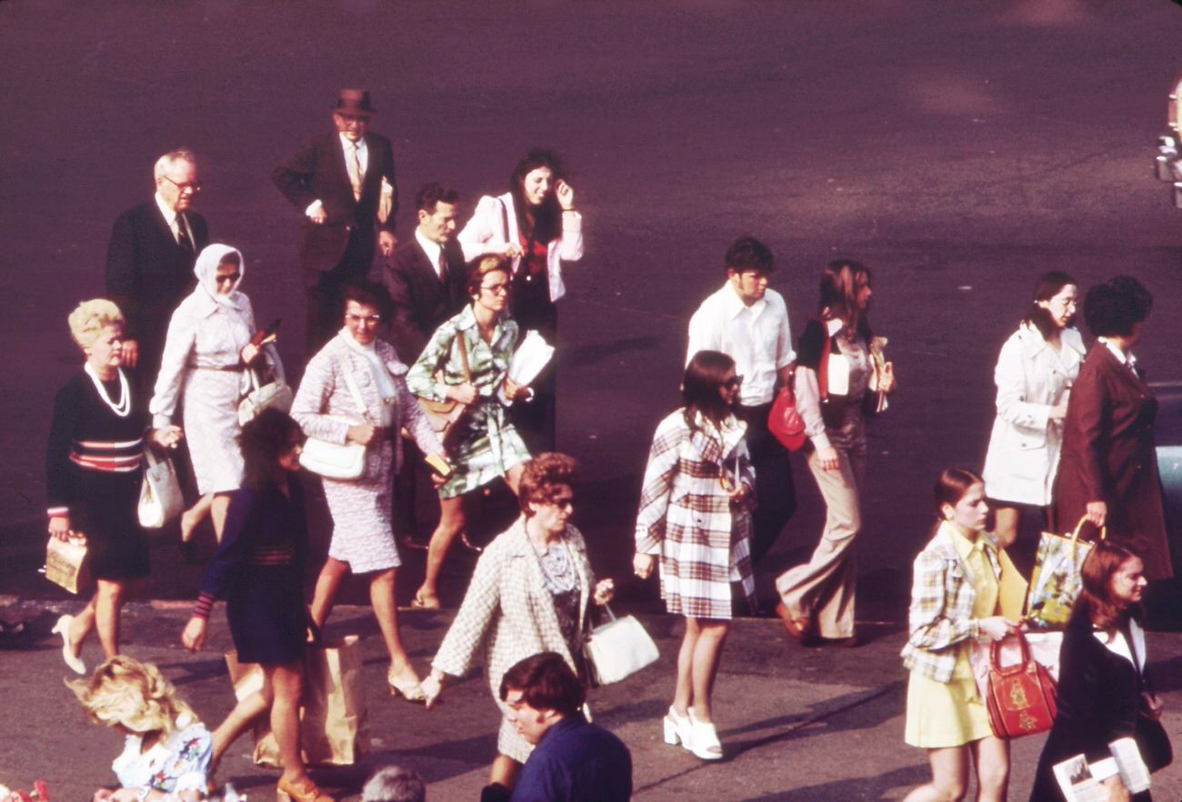 Commuters entering the terminal of the staten island ferry, 1970s