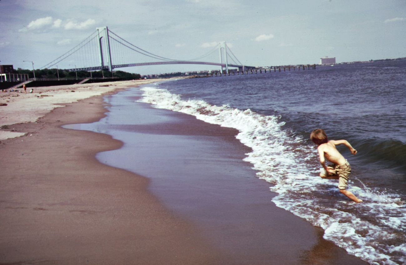 South beach, staten island. Verrazano-narrows bridge in background, 1970s