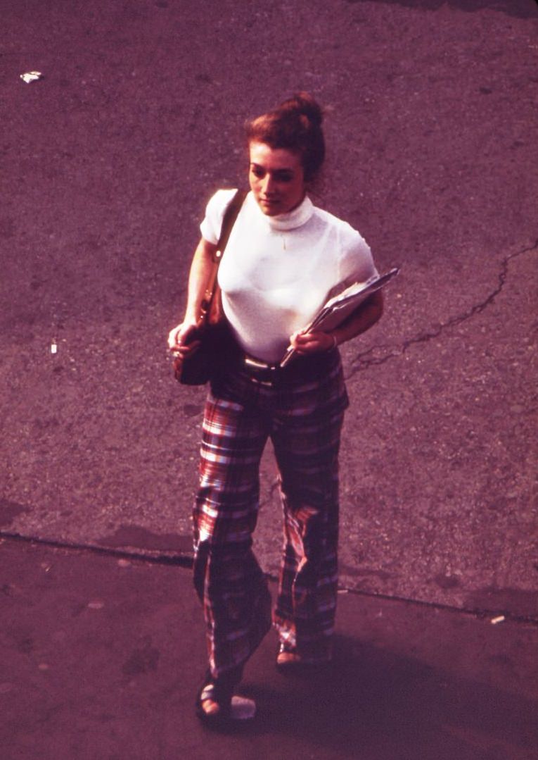 Commuter at entrance to the staten island ferry terminal in the battery, 1970s