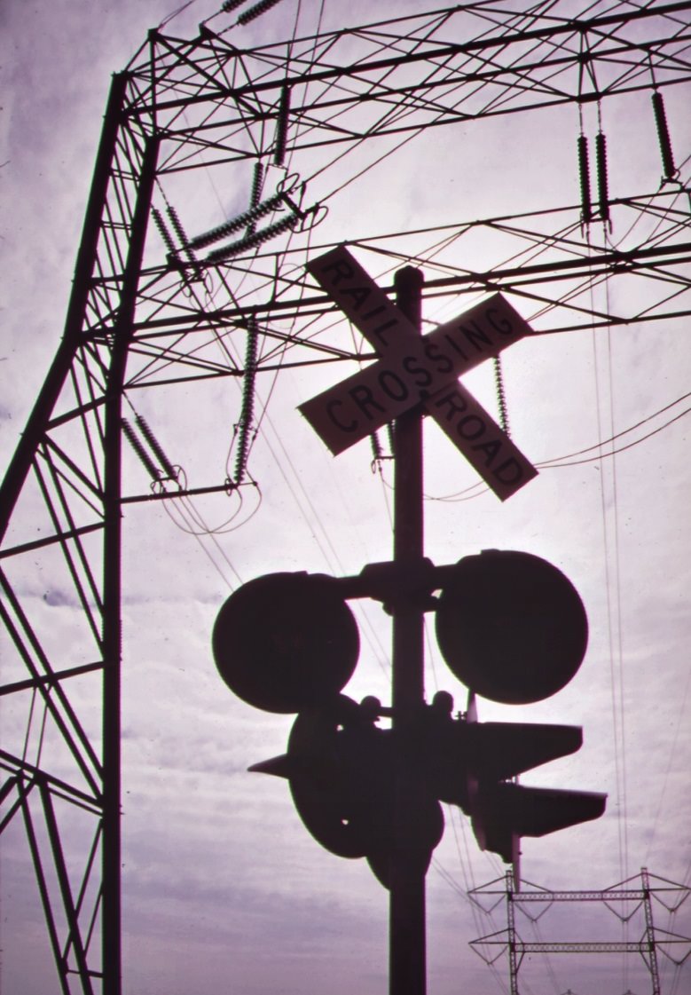 Transmission lines and railroad crossing at electrical power station on staten island, 1970s