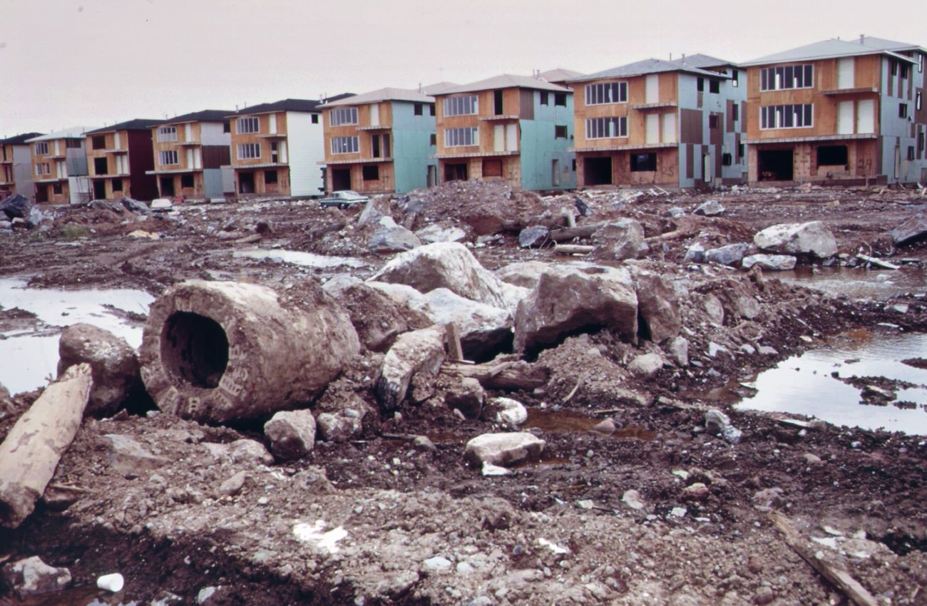 Sewer pipe ready for installation in grant city, staten island. All staten island is experiencing a building boom, a result of the completion of the verrazano-narrows bridge, 1970s