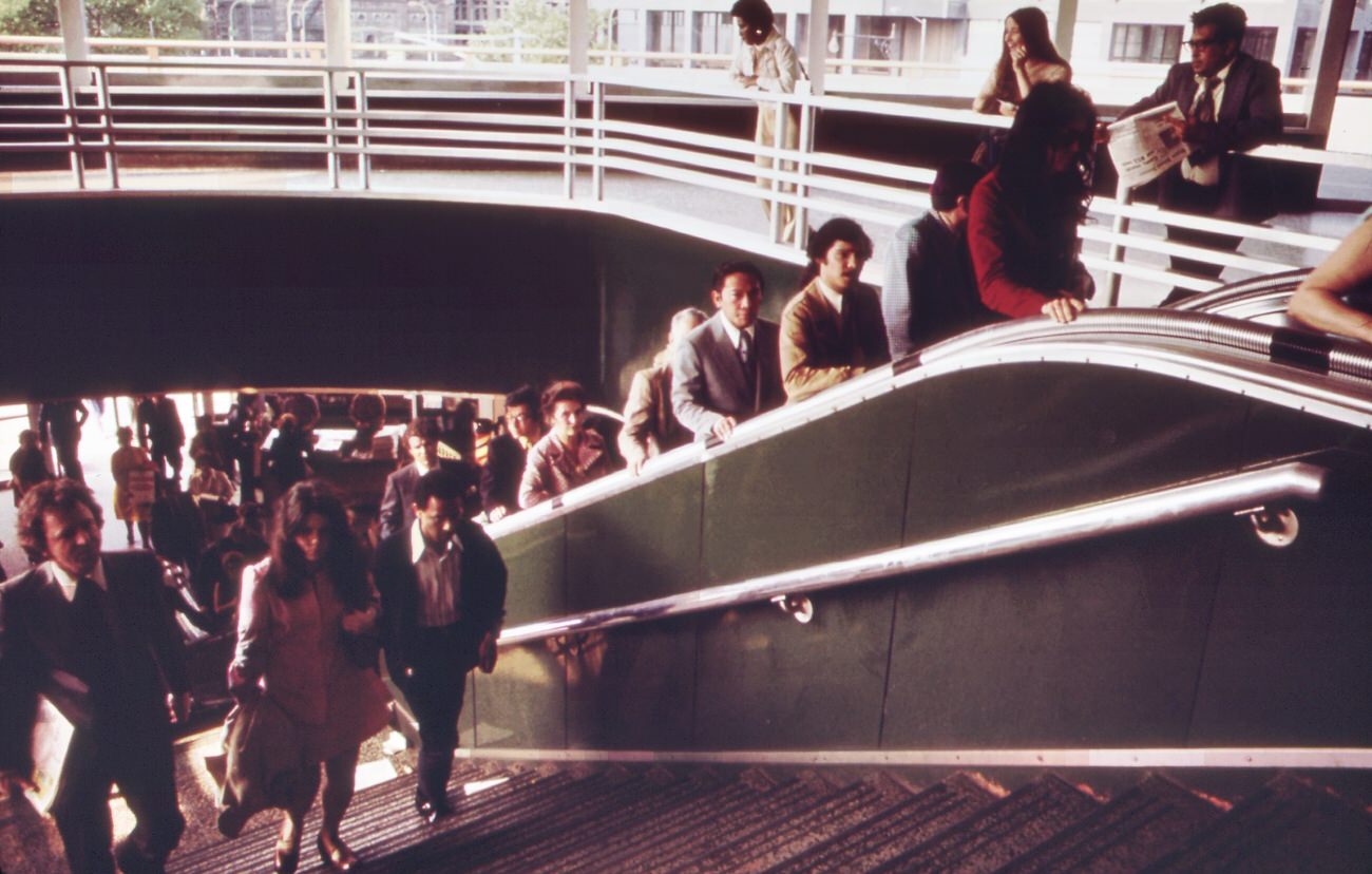 Commuters at the staten island ferry terminal in lower manhattan's battery park area, 1970s