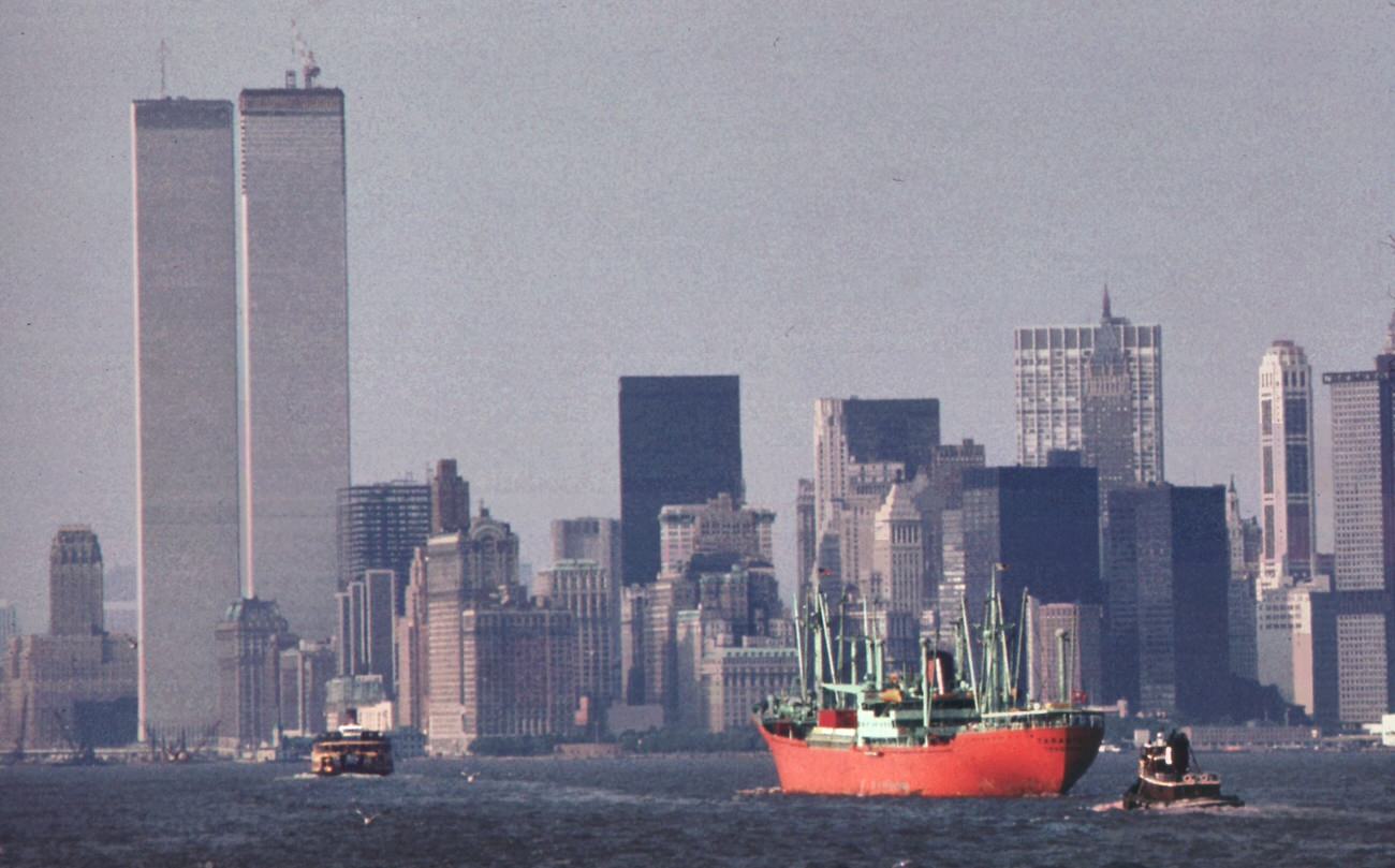 World trade center (left) and lower hudson river shipping seen from the staten island ferry, 1970s