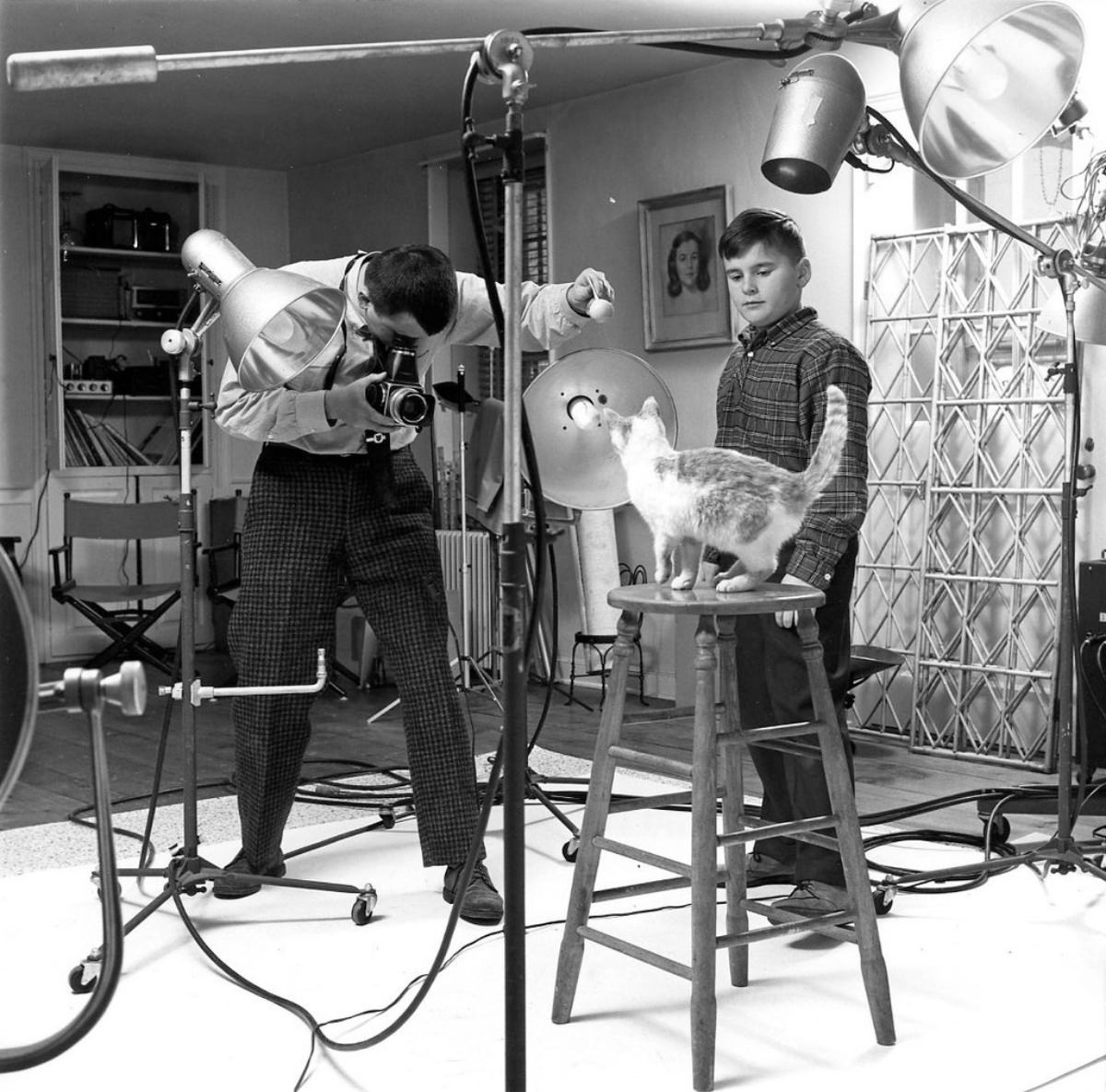 Mr. Chandoha with his son Enrico and a subject in his home studio in 1961.