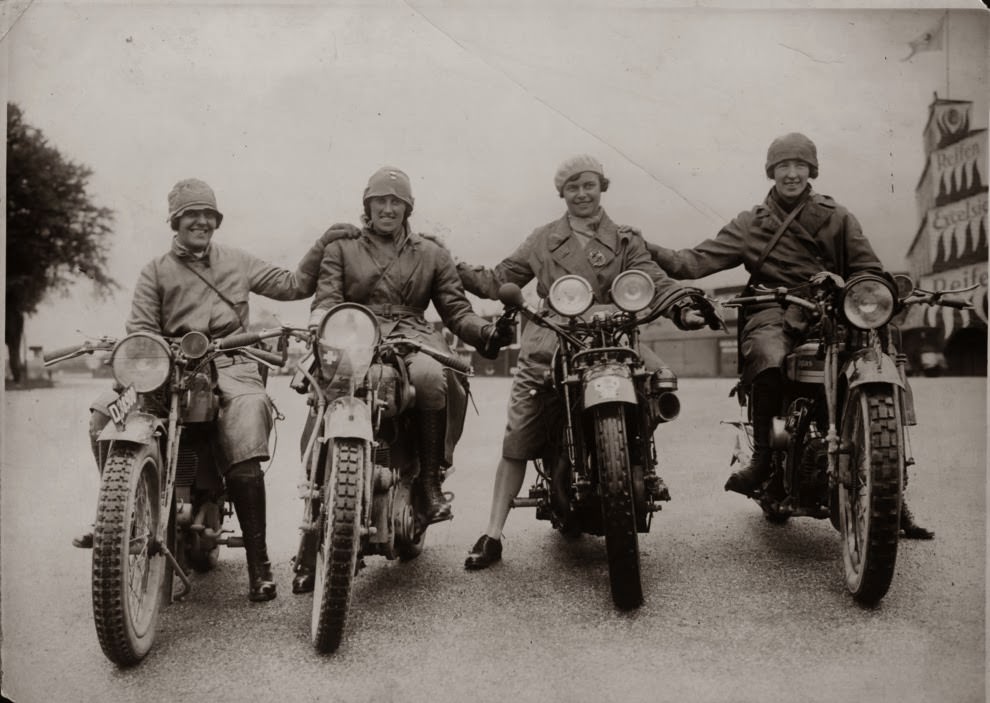 Marjorie cottle (second from left), a famous motorcyclist, and friends in germany, 1920.