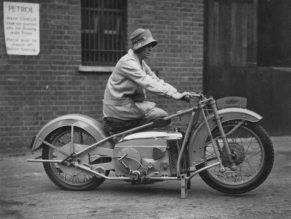 A woman on a 500 oec tinkler all-weather model designed for use on rough roads and cross-country, 1928.