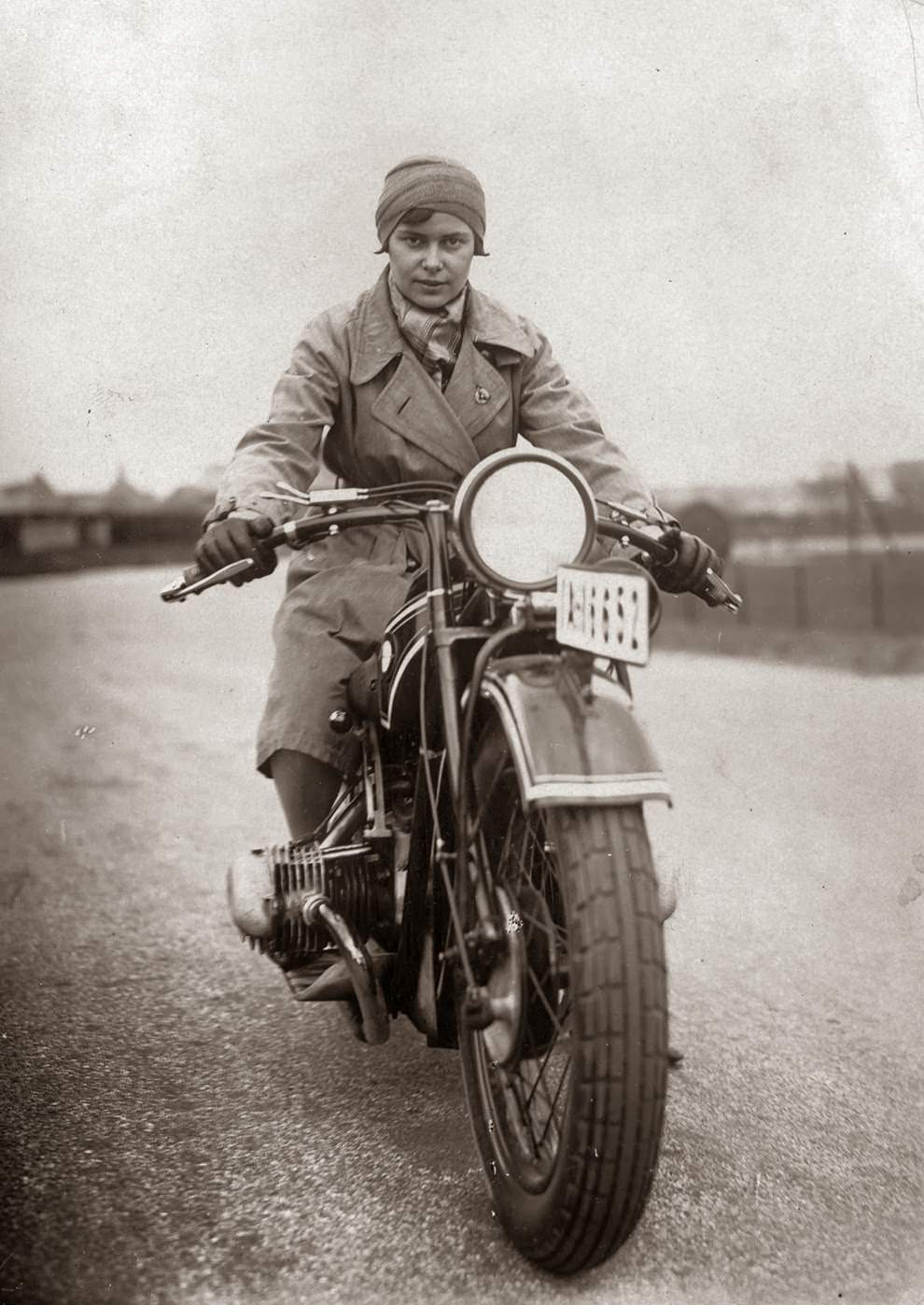 A woman on her bmw motorcycle, 1935.