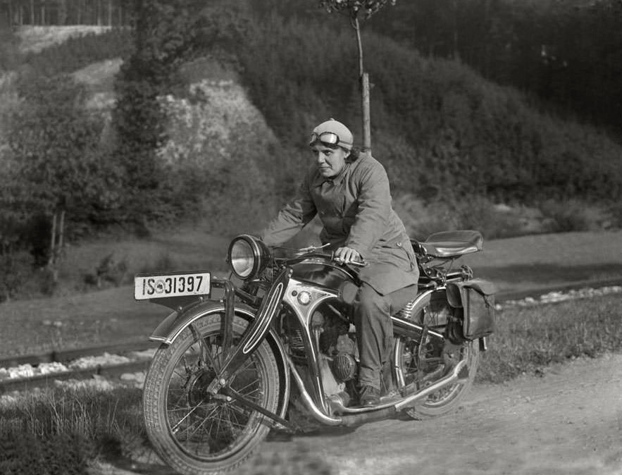 Lady riding on a vintage motorbike in germany