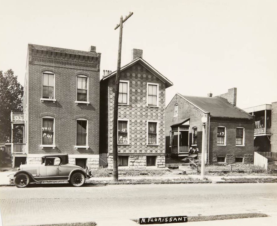 Three houses on the 4000 block of N. Florissant Ave., between Newhouse Ave. and Angelica St. with a parked car in front, 1930