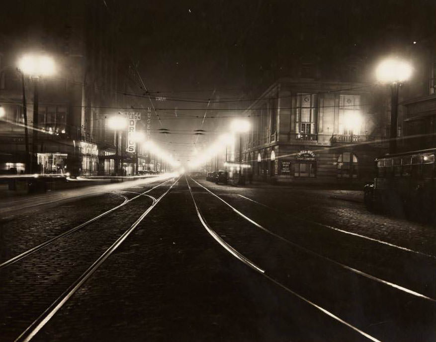 View of Washington Ave. at night looking west from its intersection with Third St, 1930