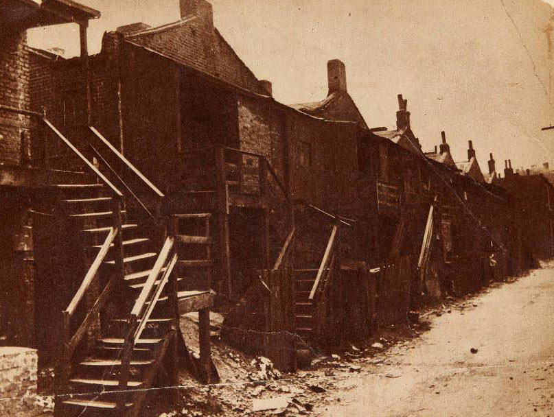 Tenement row, 1939 - Rear of a tenement row north of the downtown retail district.