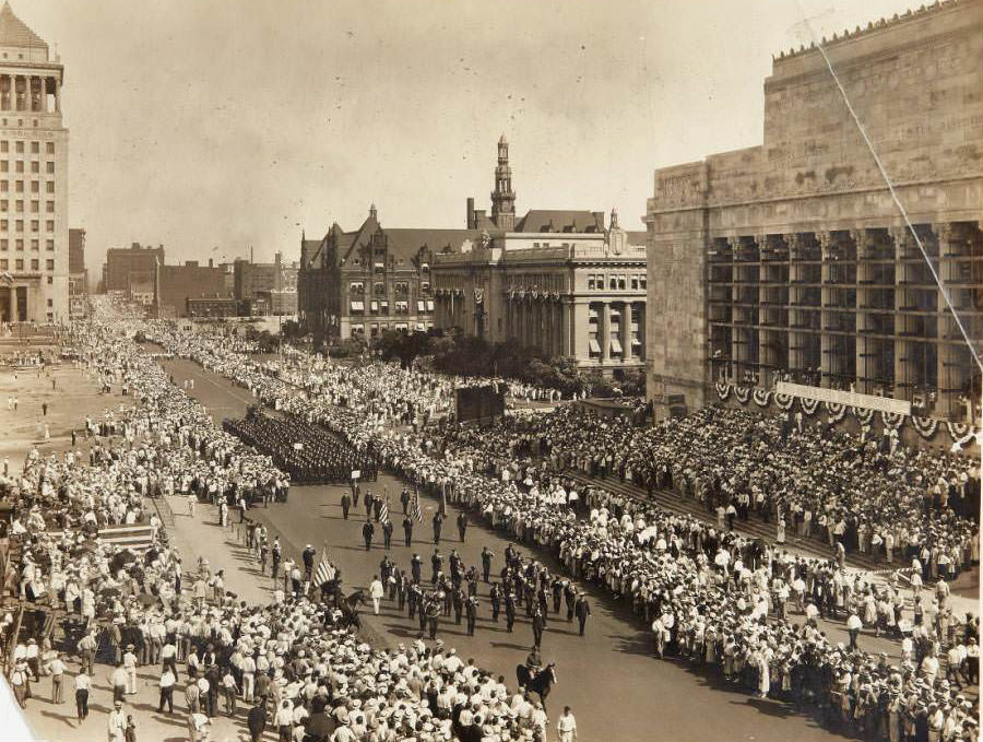N.R.A. Parade, 1933 - Parade in honor of the National Recovery Administration marching west on Market from 12th Street past City Hall and the Municipal Auditorium.