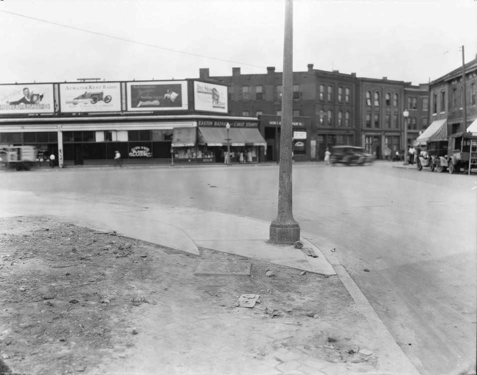 Looking west from Thomas St., Easton Ave., and N. Compton Ave. intersection. Filling station and Easton Bazaar are visible, 1930