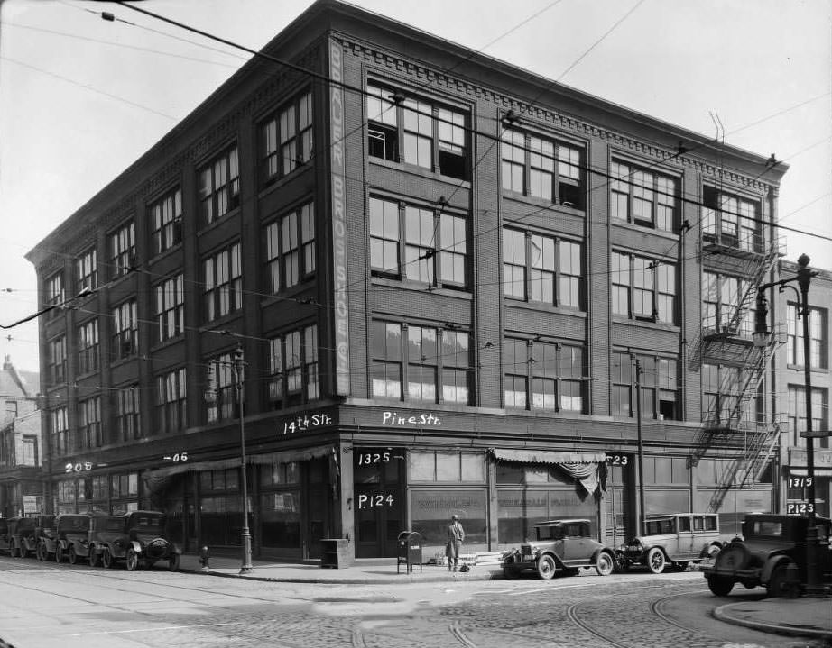 Signs for Windler Wholesale Floral Co. on window at N.E. Cor. 14th & Pine, 1930