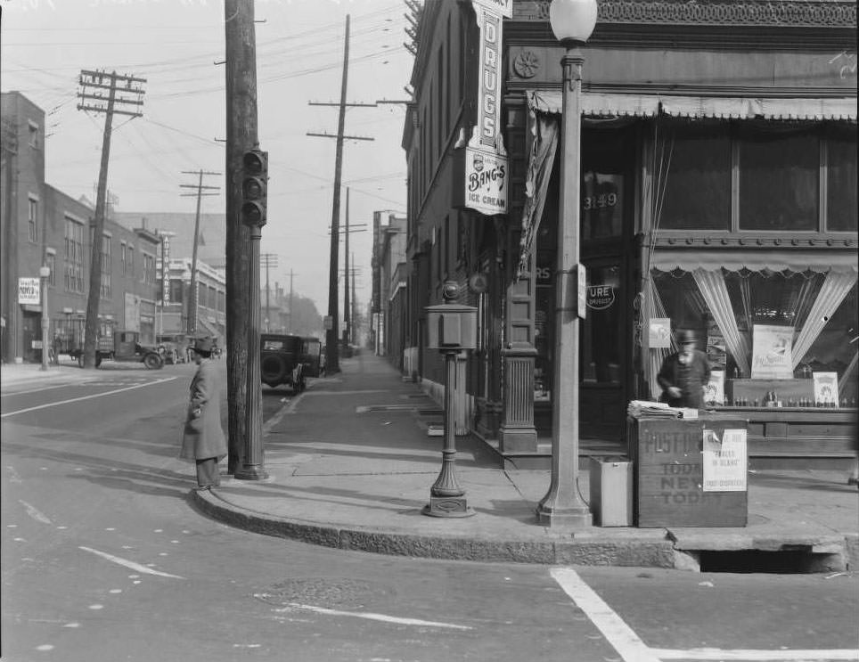 View looking North from the corner of Olive and N. Compton toward Locust Street. Standard Auto Parts is visible in the distance, 1930