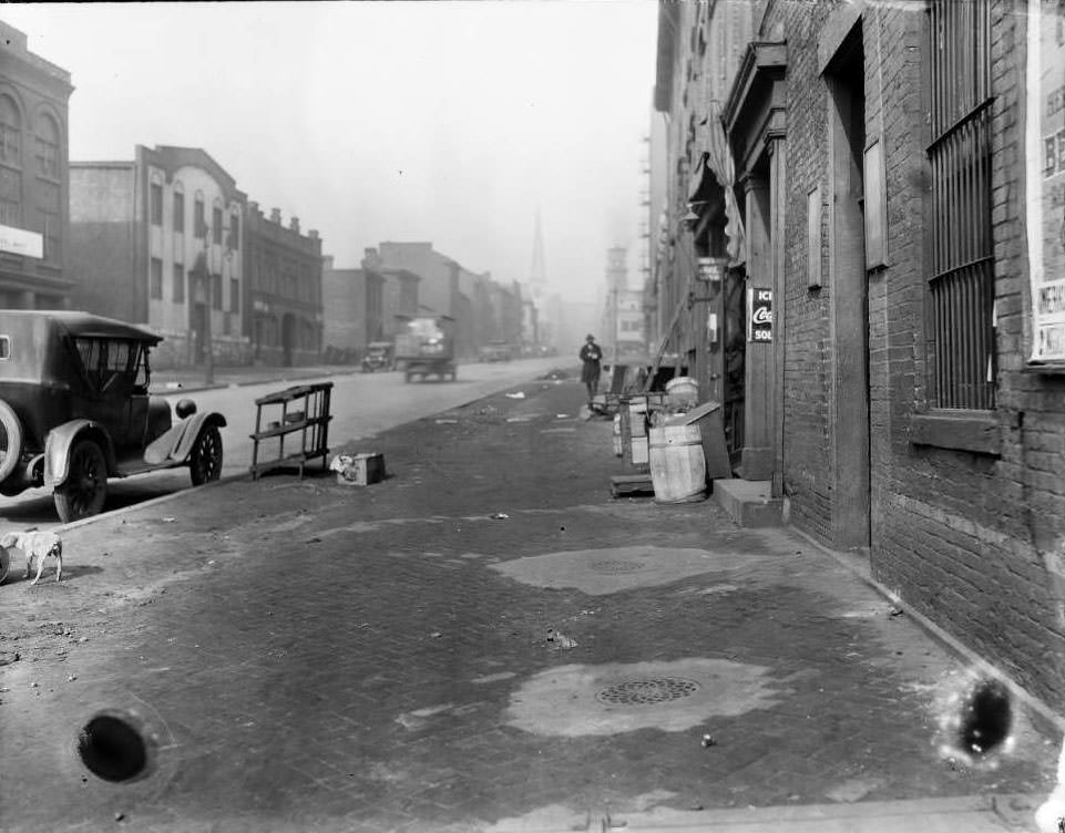 Centenary Methodist Church steeple visible at the north down 16th Street at approximately Walnut Street, 1930