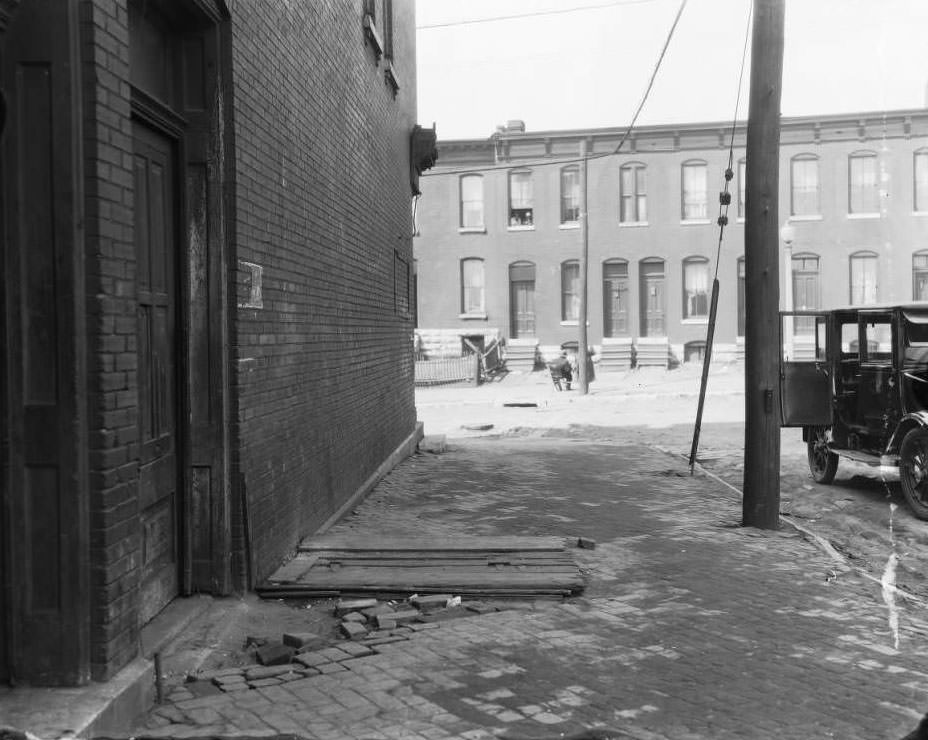 Southside of Scott Ave., 25’ from the intersection with Ewing Ave. The view is looking west, 1930