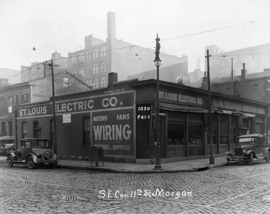 View of southeast corner of 11th and Morgan Street. St. Louis Electrical Co. visible, 1930