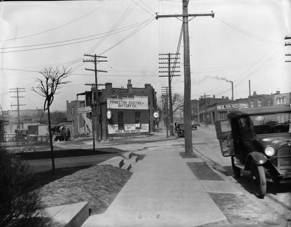 View of south St. Louis intersection including businesses, Princeton Electric and Battery Company at 3115 Gravois and Heil Company, 1930