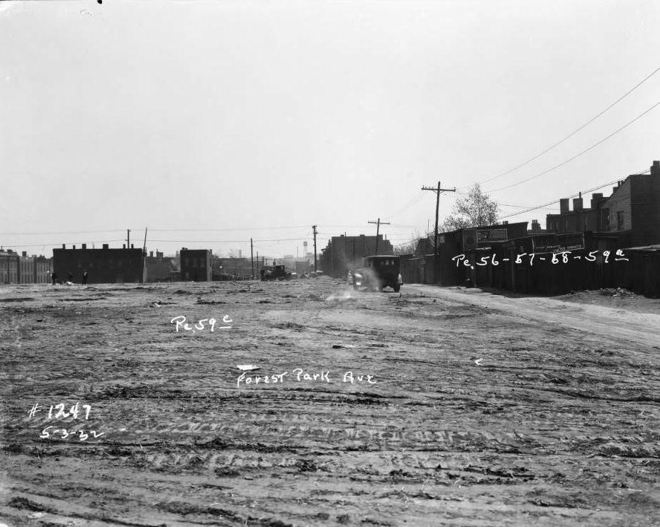 Extension of Forest Park Ave. with rear views of brick dwellings and Handlan Park, 1932.