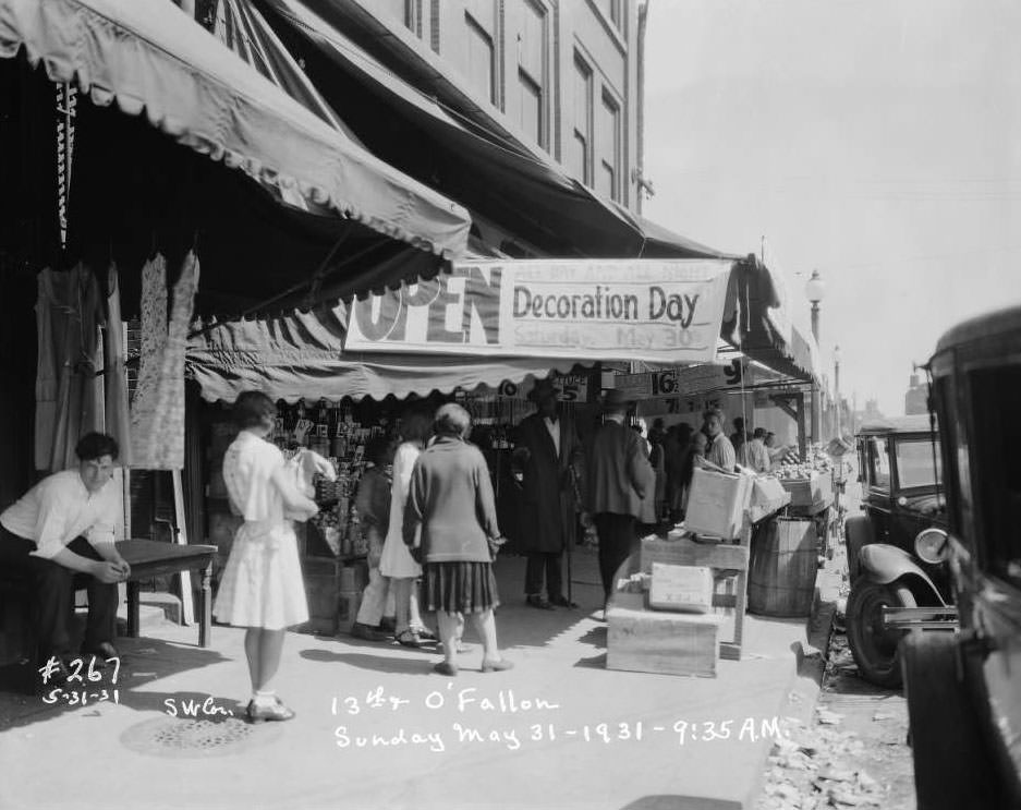 Intersection at the southwest corner of 13th and O'Fallon Streets, view of buildings and streets, 1931