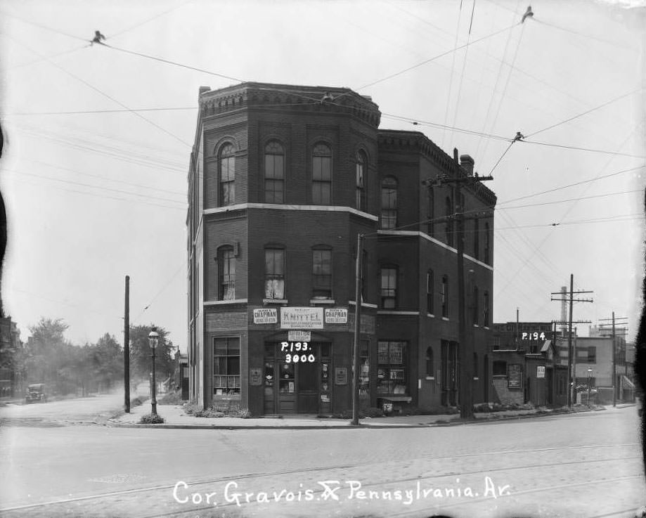 Three-story brick commercial and residential building that stood at 3000 Gravois with a grocery store on the first floor, 1930