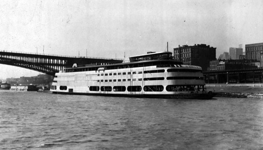 The Admiral construction with St Louis Boat and Motor Co building in the background, 1930