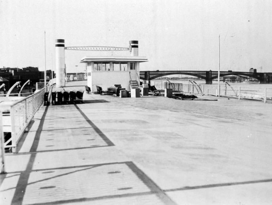 The President steamboat's fifth deck with a view of the Eads Bridge in the background, 1930