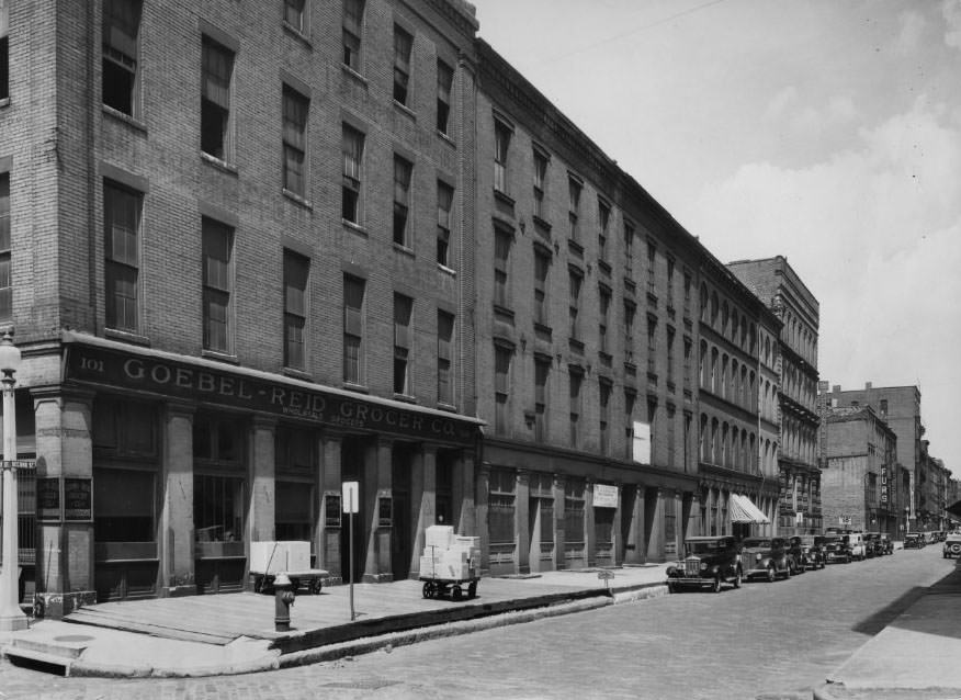 A plaque on a building on Second Street, sold for $120 in 1768, highlights the antiquity of the proposed riverfront improvement project area, 1930