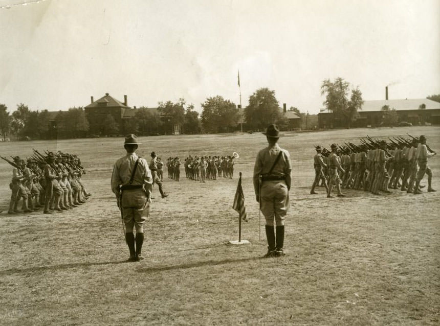 One of the companies of civilian soldiers at the Citizens' Military Training Camp at Jefferson Barracks turning eyes right during the regimental parade,