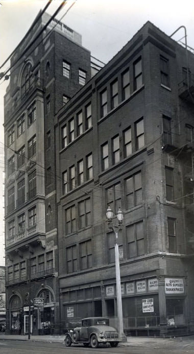 Five-story building at 1124-26 Locust street purchased by T.M. Sayman, head of T.M. Sayman Products Company. Property on the east is the Town Club, 1930
