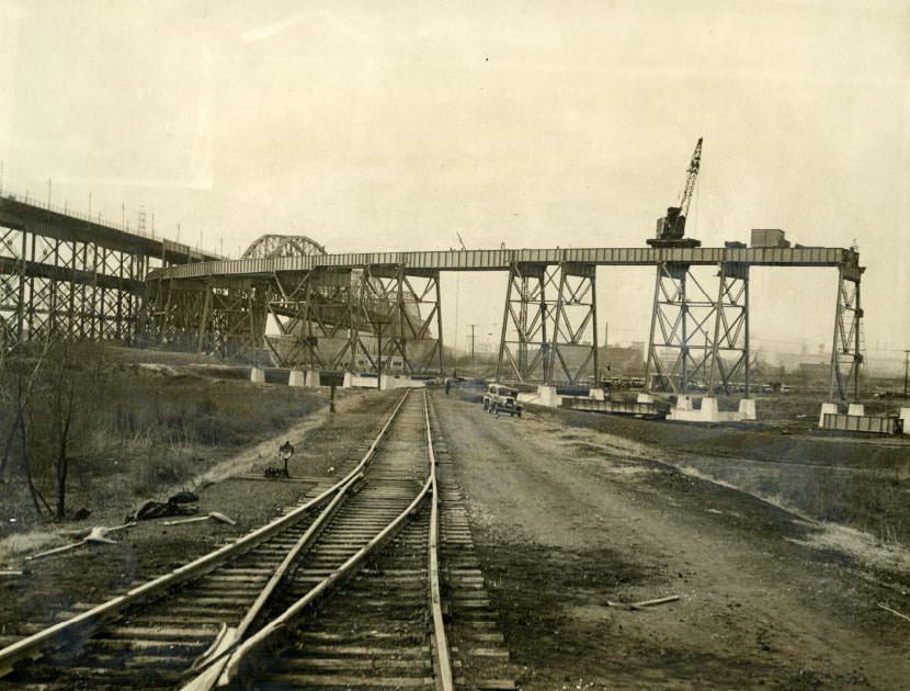 Erecting the new northeast approach to the St. Louis Municipal Bridge, now known as the MacArthur Bridge, 1930