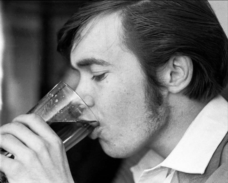 Pete enjoys an after shift pint in the pub across the bridge from the Plains, Totnes pub, 1970
