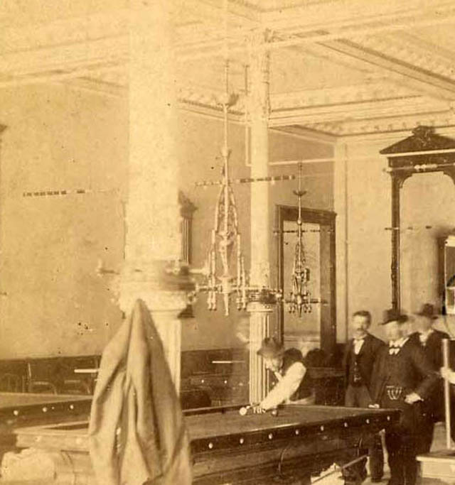 Men playing billiards in Baldwin Hotel, San Francisco, CA, 1870s