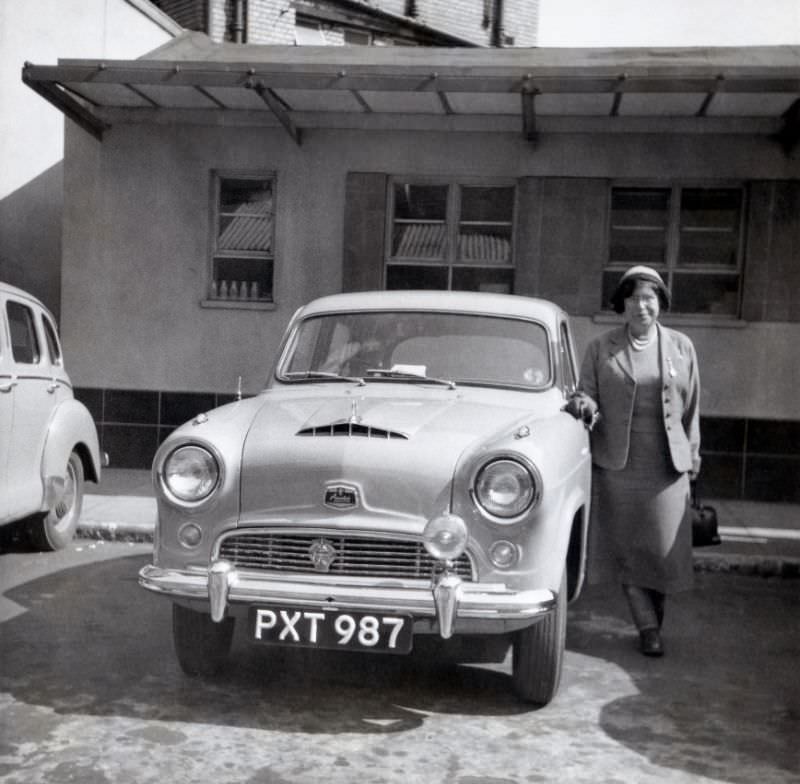 Austin A40 Cambridge on a sunny day in early spring, equipped with an additional driving light and an "AA" radiator badge, April 1955.