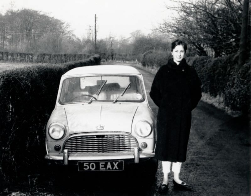 Austin Mini in a typical English country lane on a sunny winter's day, December 1962.