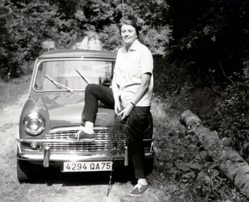 Austin Mini on a forest track in summertime, registered in the city of Paris, 1965.