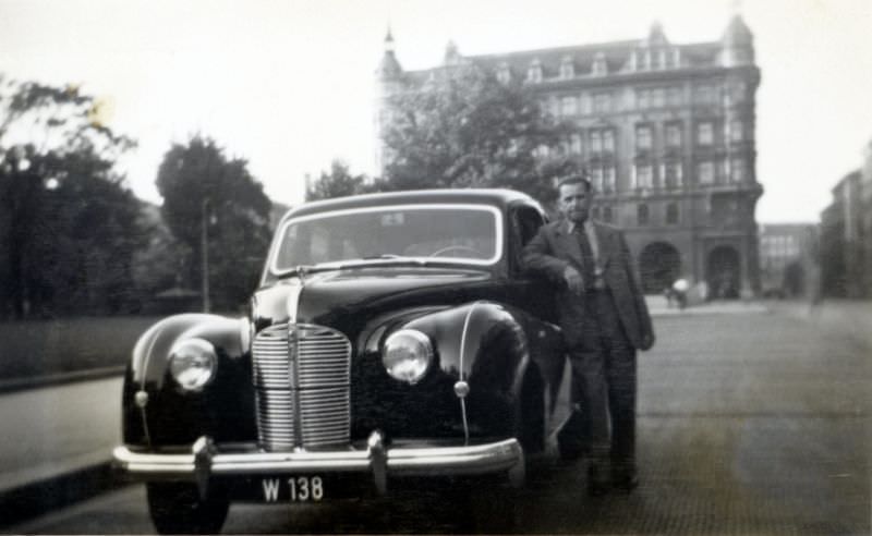 Left-hand drive Austin A70 Hampshire in a city street, registered in the city of Vienna, 1949.